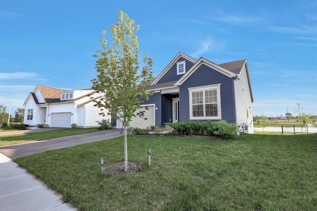 7 Erin Hills Rd, Commercial Point, OH 43116 - view of front of house with an attached garage and asphalt driveway