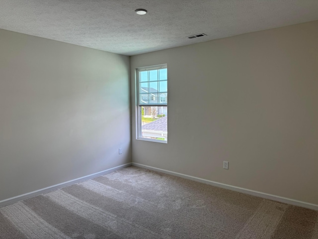 3780 Brody Dr Lot 187, Grove City, OH 43123 - unfurnished room featuring carpet floors and a textured ceiling