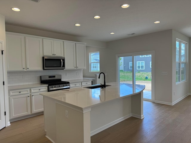 3780 Brody Dr Lot 187, Grove City, OH 43123 - kitchen featuring appliances with stainless steel finishes, light wood-style flooring, plenty of natural light, and recessed lighting