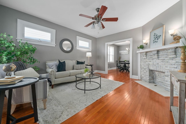 1542 S 4th St, Columbus, OH 43207 - living area with a ceiling fan, baseboards, and wood-type flooring