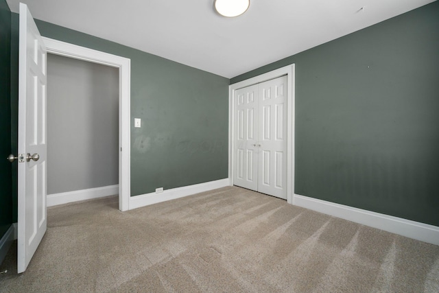 1542 S 4th St, Columbus, OH 43207 - unfurnished bedroom with carpet, a closet, and baseboards