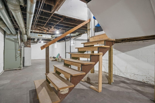 1542 S 4th St, Columbus, OH 43207 - unfinished below grade area featuring heating unit and stairs