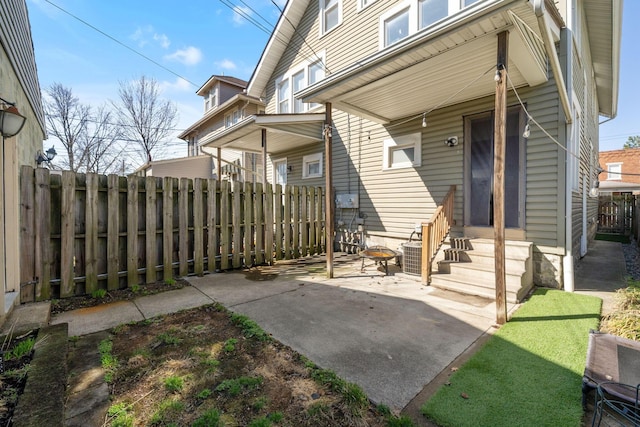 1542 S 4th St, Columbus, OH 43207 - view of patio / terrace with central air condition unit, entry steps, and fence