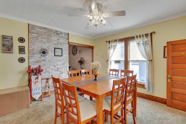 123 Campbell St, Delaware, OH 43015 - dining room featuring light carpet, baseboards, crown molding, and ceiling fan