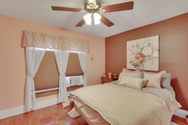 123 Campbell St, Delaware, OH 43015 - bedroom featuring cooling unit, baseboards, ceiling fan, and wood finished floors