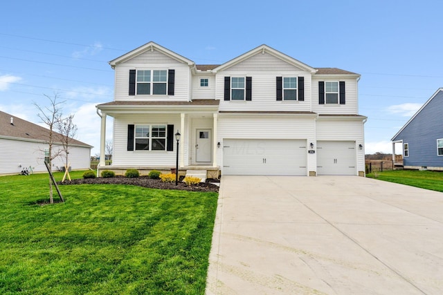 view of front of home featuring a front lawn, an attached garage, and concrete driveway