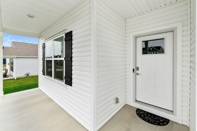 property entrance with a porch