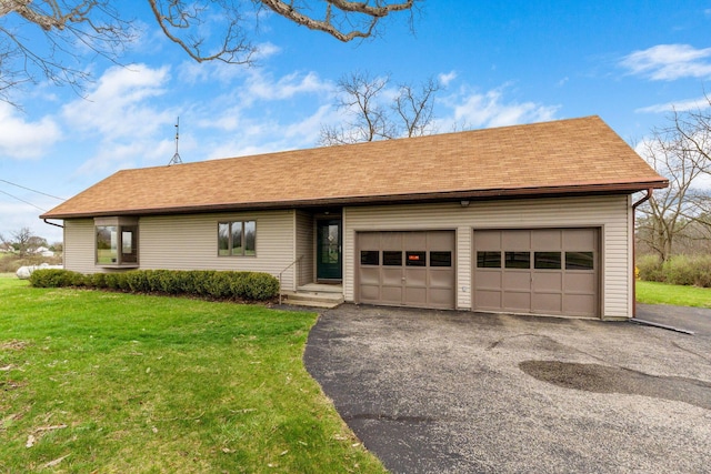 14963 Payne Rd, Marysville, OH 43040 - view of front of property featuring driveway, an attached garage, a front lawn, and roof with shingles