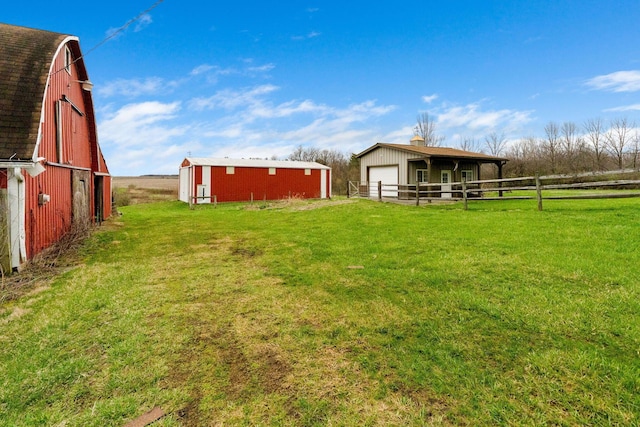 14963 Payne Rd, Marysville, OH 43040 - view of yard with fence, a barn, an outdoor structure, and a garage