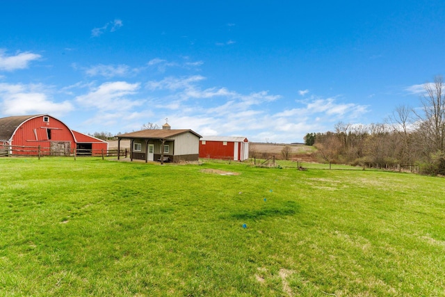 14963 Payne Rd, Marysville, OH 43040 - view of yard with an outbuilding, fence, and a rural view