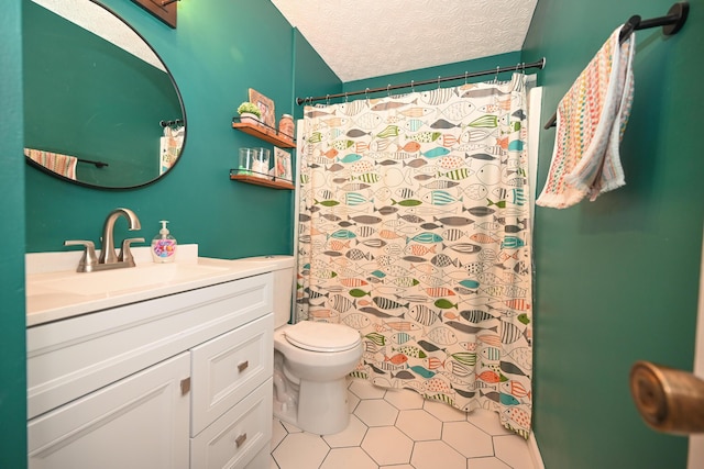 full bath featuring a shower with shower curtain, vanity, tile patterned flooring, a textured ceiling, and toilet