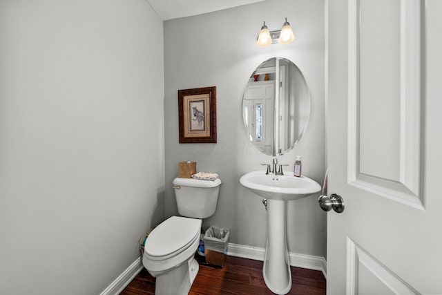 4600 Hirth Hill Rd E, Grove City, OH 43123 - bathroom featuring toilet, baseboards, and wood finished floors