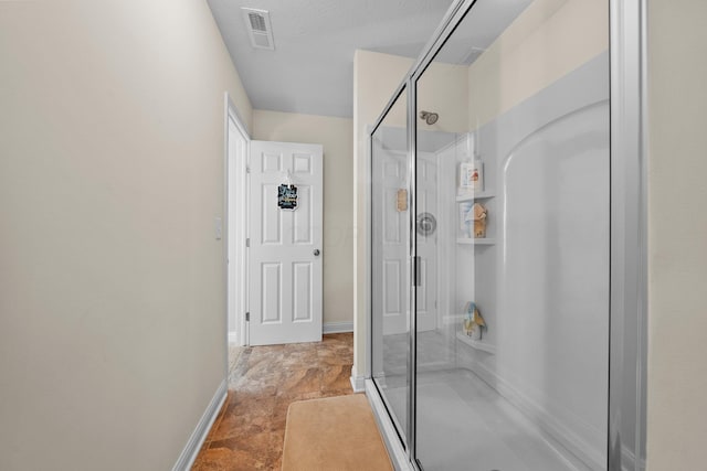 4600 Hirth Hill Rd E, Grove City, OH 43123 - full bath featuring a shower stall, baseboards, and visible vents
