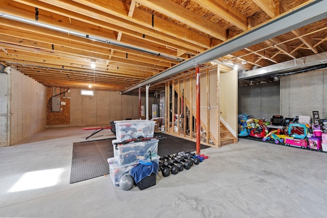 4600 Hirth Hill Rd E, Grove City, OH 43123 - unfinished basement with electric panel, stairs, and brick wall