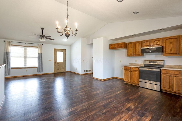 kitchen with light countertops, exhaust hood, stainless steel electric stove, visible vents, and brown cabinets