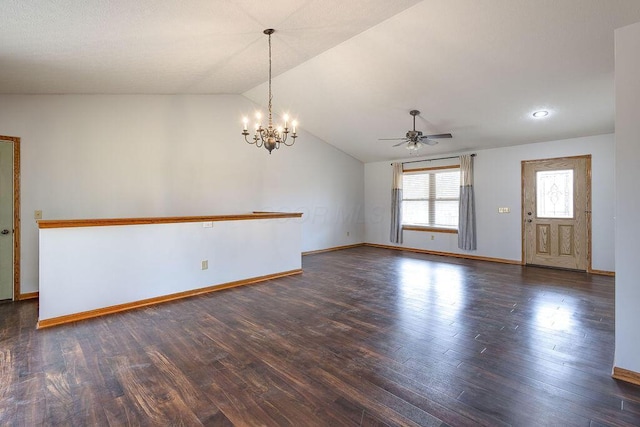 unfurnished living room featuring baseboards, ceiling fan with notable chandelier, lofted ceiling, and wood finished floors