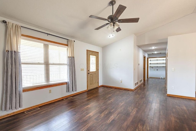entryway with visible vents, vaulted ceiling, a ceiling fan, and wood finished floors