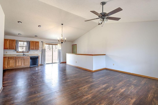 unfurnished living room featuring baseboards, a sink, ceiling fan with notable chandelier, and dark wood finished floors