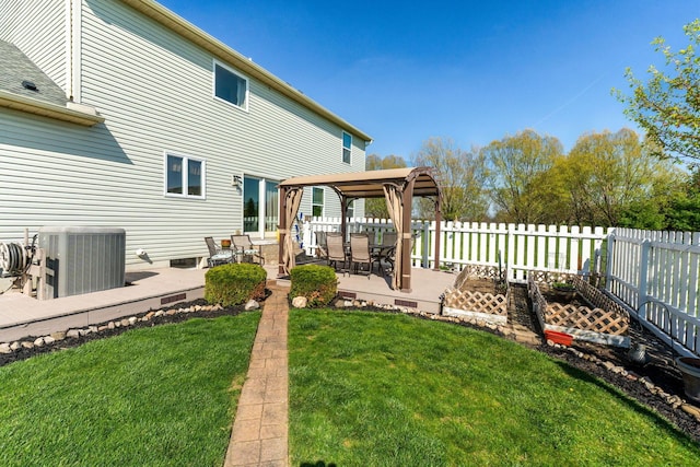 view of yard with a fenced backyard, a gazebo, a patio area, and cooling unit