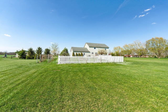 view of yard with fence