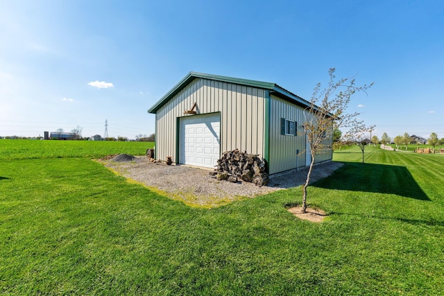 detached garage featuring driveway