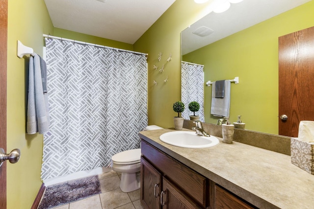 full bathroom with tile patterned floors, vanity, curtained shower, toilet, and visible vents
