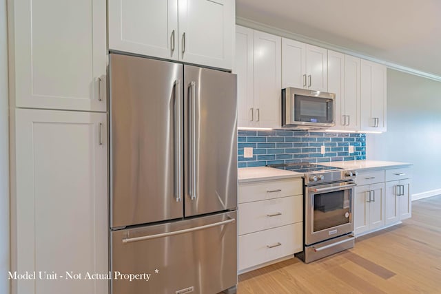 5177 Highpointe Lakes Dr Unit 9403, Westerville, OH 43081 - kitchen featuring light wood finished floors, light countertops, and stainless steel appliances