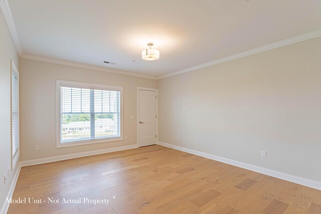 5177 Highpointe Lakes Dr Unit 9403, Westerville, OH 43081 - spare room featuring light wood-style flooring, ornamental molding, and baseboards