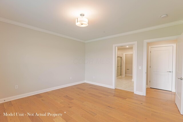 5177 Highpointe Lakes Dr Unit 9403, Westerville, OH 43081 - empty room with ornamental molding, baseboards, and light wood-type flooring