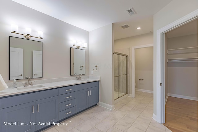 5177 Highpointe Lakes Dr Unit 9403, Westerville, OH 43081 - full bathroom with a sink, double vanity, visible vents, and a shower stall