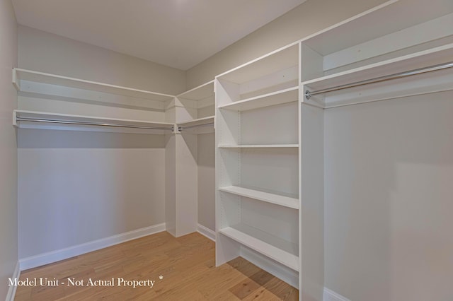 5177 Highpointe Lakes Dr Unit 9403, Westerville, OH 43081 - walk in closet featuring wood finished floors
