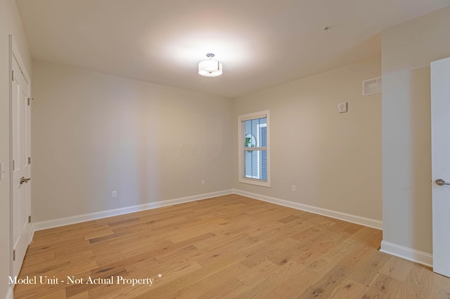 5177 Highpointe Lakes Dr Unit 9403, Westerville, OH 43081 - spare room featuring light wood finished floors, baseboards, and visible vents