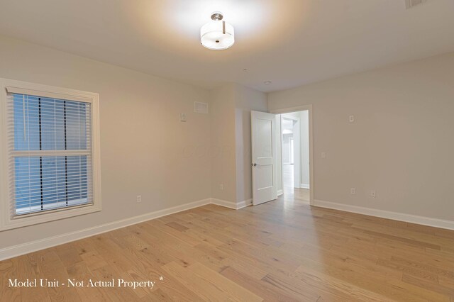 5177 Highpointe Lakes Dr Unit 9403, Westerville, OH 43081 - empty room featuring baseboards, visible vents, and light wood-style floors