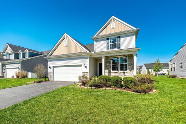 traditional-style home featuring a garage, aphalt driveway, board and batten siding, and stone siding