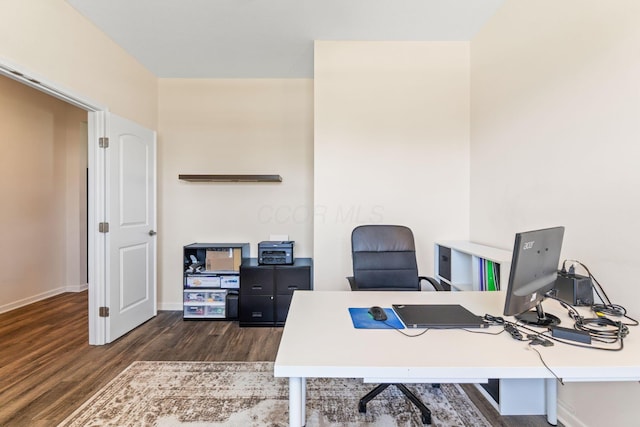 office with baseboards and wood finished floors