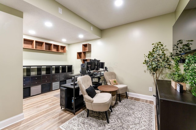 office space with baseboards, recessed lighting, and wood finished floors