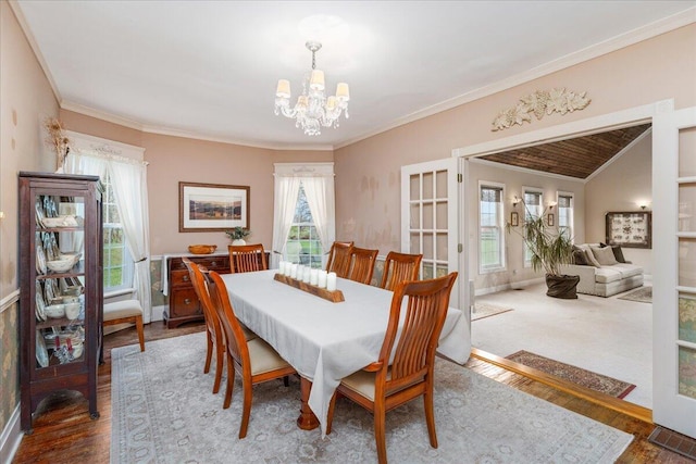 8056 Summit Rd SW, Pataskala, OH 43062 - dining space featuring crown molding, a chandelier, and wood finished floors