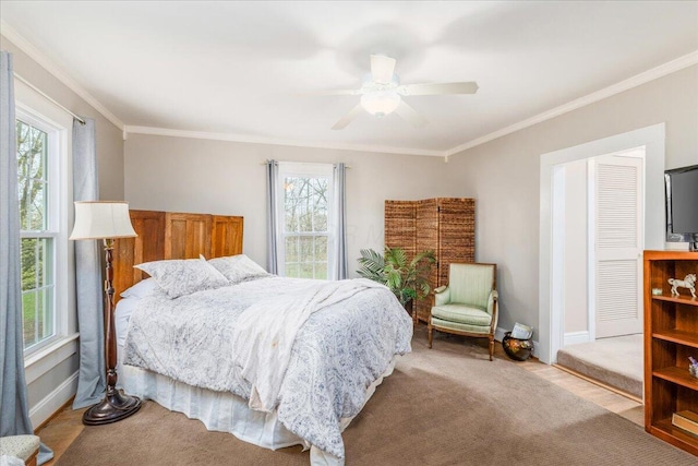 8056 Summit Rd SW, Pataskala, OH 43062 - carpeted bedroom with crown molding, baseboards, and a ceiling fan