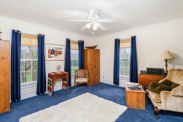 8056 Summit Rd SW, Pataskala, OH 43062 - sitting room with crown molding, carpet, a ceiling fan, and plenty of natural light