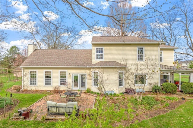 8056 Summit Rd SW, Pataskala, OH 43062 - back of house with a yard, an outdoor fire pit, and a chimney