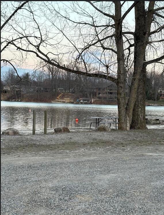 view of property's community with a water view
