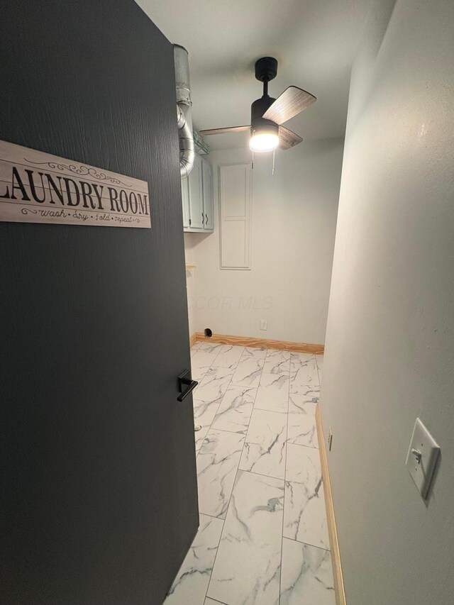 7326 State Route 19 Unit 2, Lot 321, Mount Gilead, OH 43338 - hallway featuring light marble finish floors and baseboards