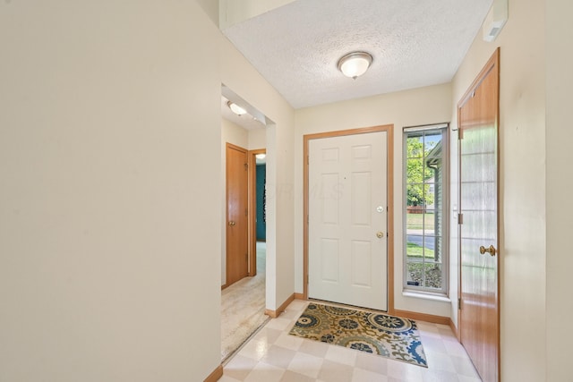 3092 Andrew James Dr, Hilliard, OH 43026 - entryway with light flooring and a textured ceiling