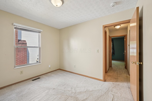 3092 Andrew James Dr, Hilliard, OH 43026 - unfurnished room with carpet flooring, a textured ceiling, and a smoke detector