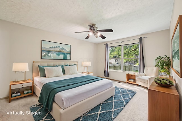3092 Andrew James Dr, Hilliard, OH 43026 - carpeted bedroom featuring a textured ceiling and ceiling fan