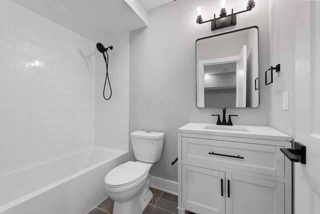 bathroom featuring washtub / shower combination, baseboards, toilet, tile patterned floors, and vanity