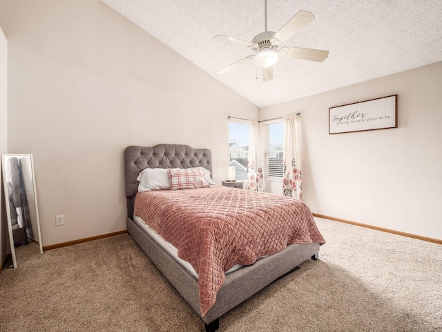 carpeted bedroom featuring baseboards, lofted ceiling, ceiling fan, and a textured ceiling