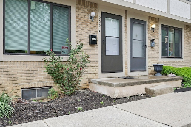 5692 Great Hall Ct, Columbus, OH 43231 - view of exterior entry with brick siding