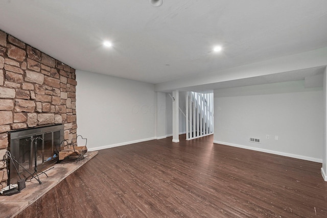 5692 Great Hall Ct, Columbus, OH 43231 - unfurnished living room with wood finished floors, baseboards, a fireplace, and recessed lighting