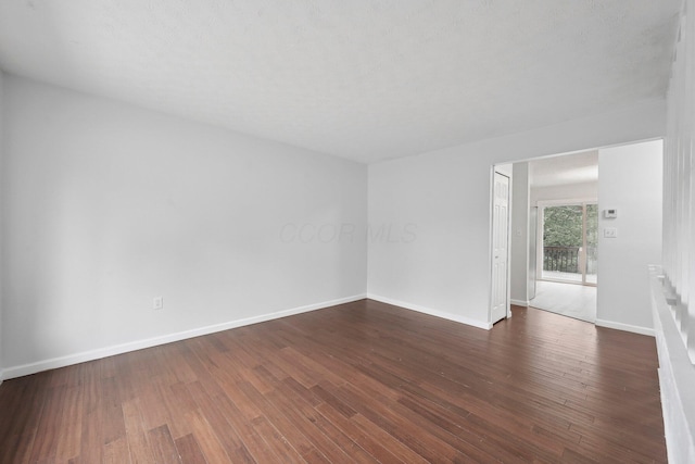 5692 Great Hall Ct, Columbus, OH 43231 - unfurnished room with baseboards and dark wood-style floors